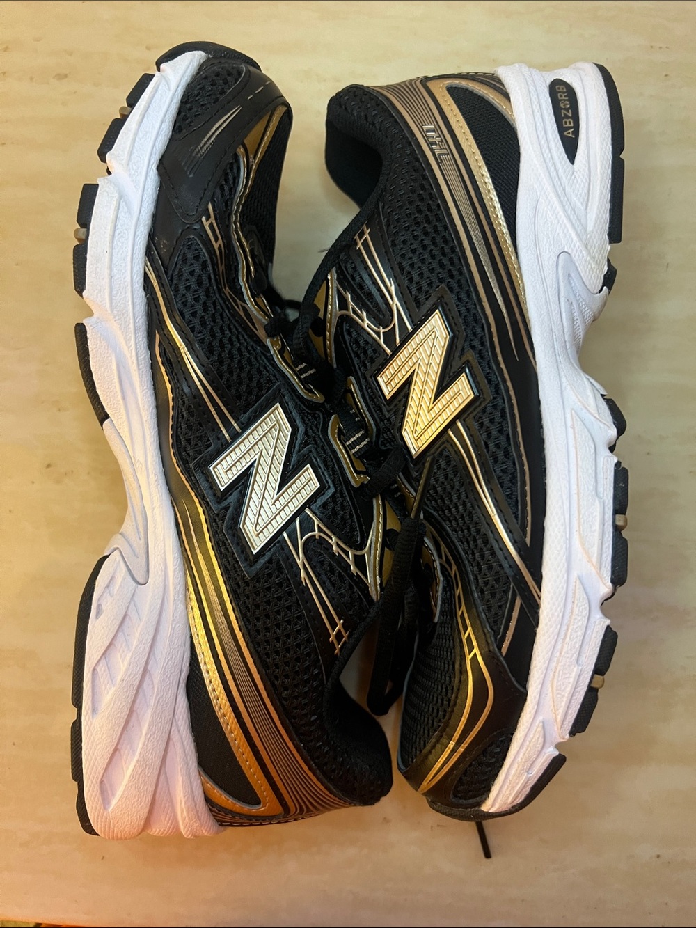 New Balance Men’s Black and Gold Athletic Running Shoes